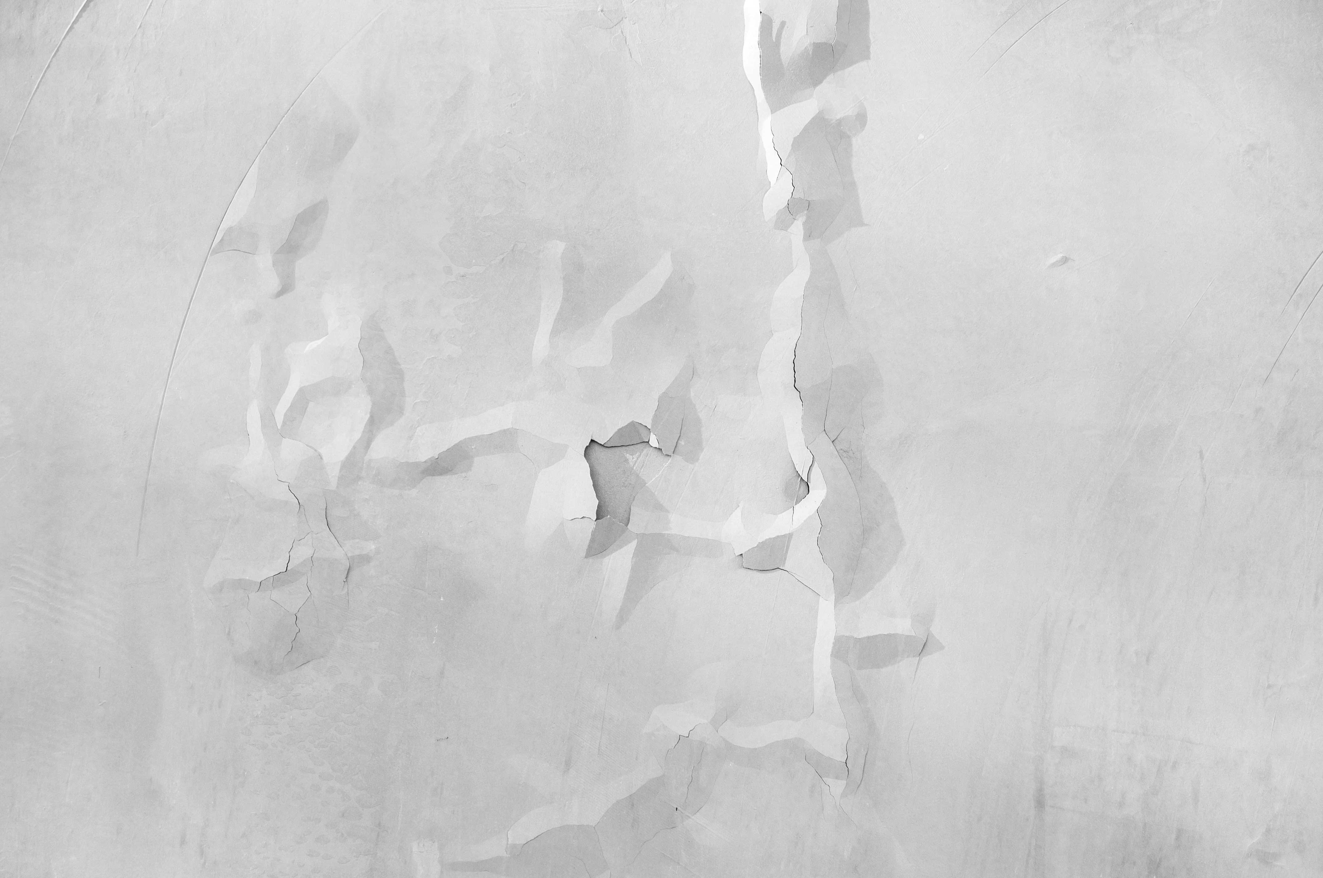 A white surface with clear bumps in it due to the paint being uncured.